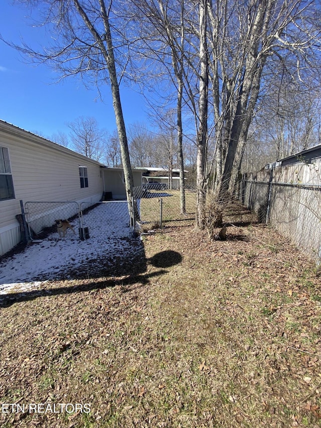 view of yard with fence