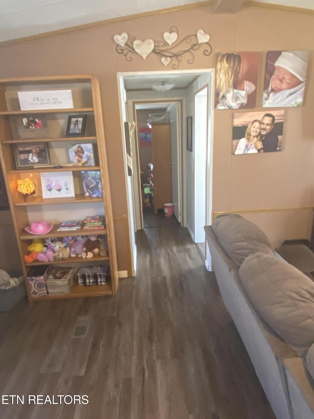 corridor with dark wood-type flooring