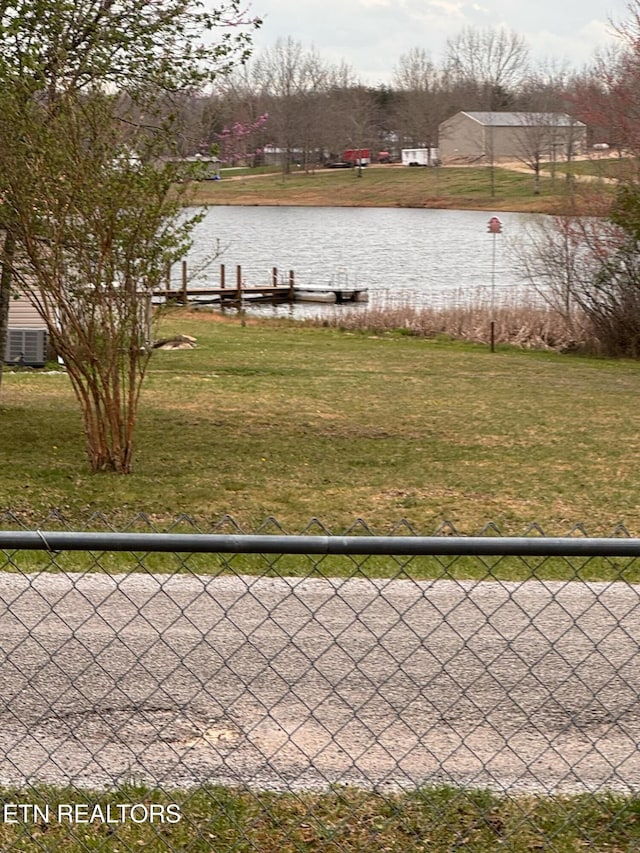 166 Sligo St, Crossville, TN 38572 - exterior space with a water view, fence, and a boat dock