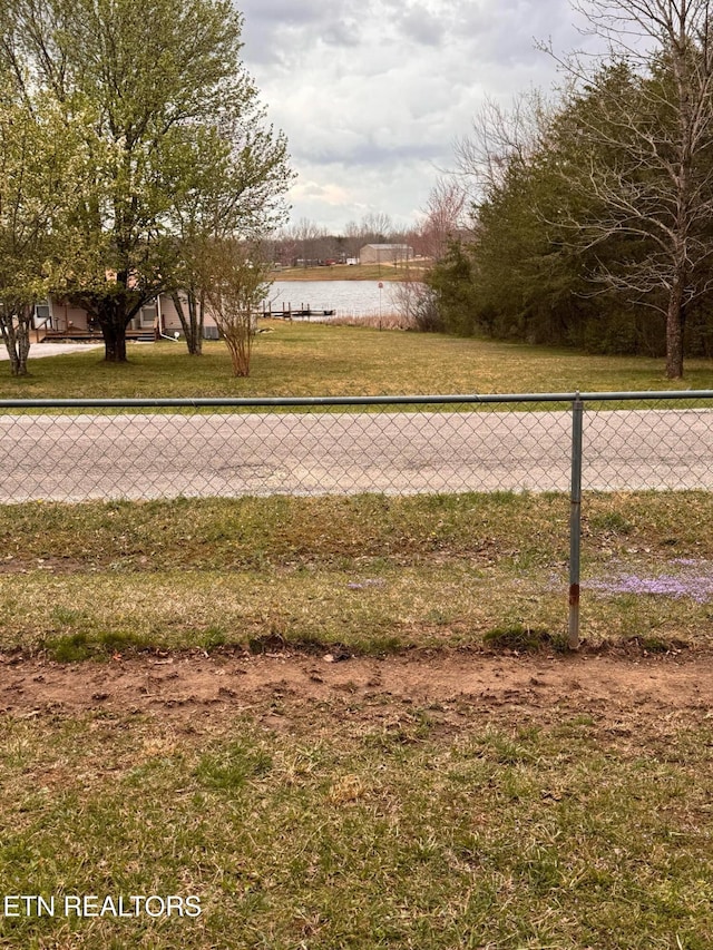 166 Sligo St, Crossville, TN 38572 - view of property's community with a water view and fence