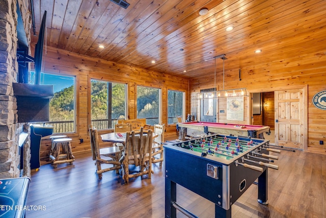 playroom with recessed lighting, wooden ceiling, wooden walls, and wood finished floors