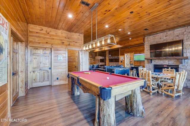 game room featuring wooden ceiling, pool table, wooden walls, and wood finished floors