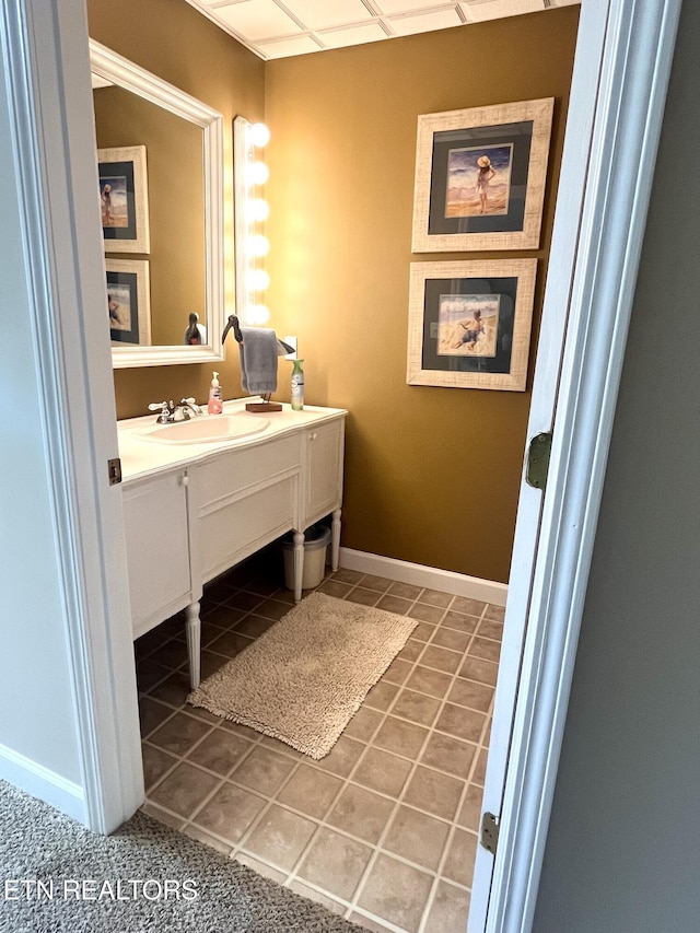 353 Southshore Dr, Greenback, TN 37742 - bathroom with tile patterned floors, vanity, and baseboards