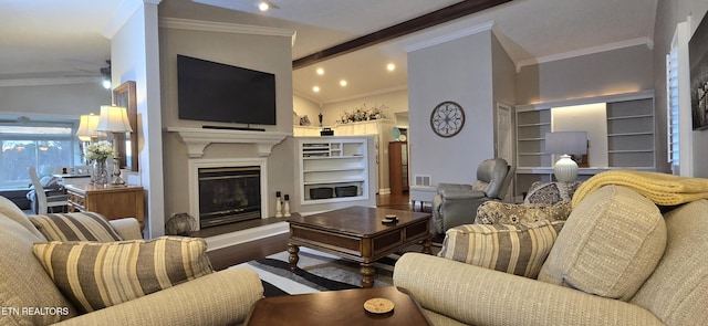 353 Southshore Dr, Greenback, TN 37742 - living area featuring ornamental molding, wood finished floors, a glass covered fireplace, ceiling fan, and built in shelves