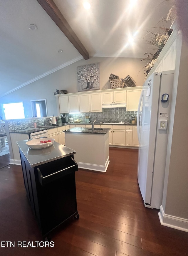 353 Southshore Dr, Greenback, TN 37742 - kitchen with white appliances, a kitchen island with sink, decorative backsplash, dark wood-type flooring, and crown molding