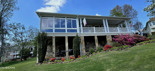 353 Southshore Dr, Greenback, TN 37742 - rear view of property featuring stone siding and a yard