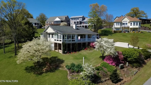 353 Southshore Dr, Greenback, TN 37742 - rear view of property featuring a yard and a residential view