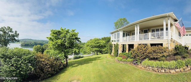 353 Southshore Dr, Greenback, TN 37742 - rear view of house featuring a lawn