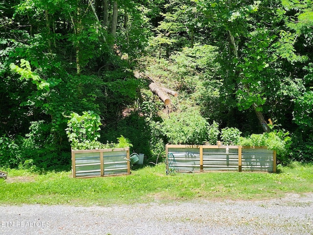 surrounding community featuring fence