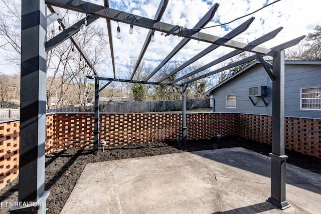 view of patio / terrace with fence and a pergola