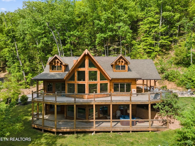 3859 Clabo Mountain Ln, Sevierville, TN 37862 - rear view of property with a wooden deck, a forest view, and a lawn