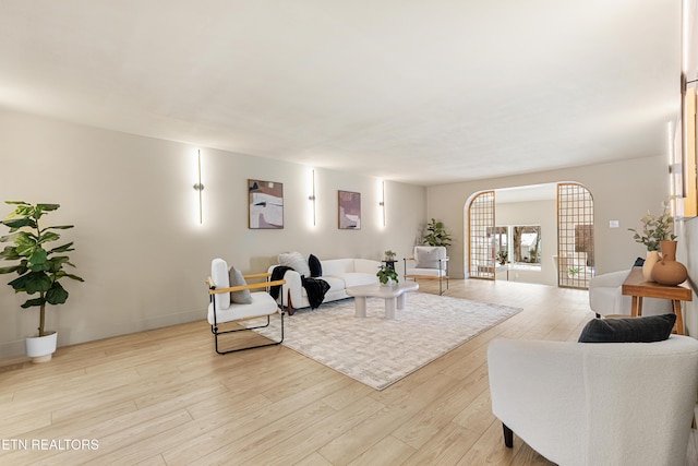 living area featuring light wood-style flooring