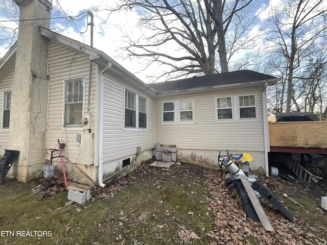 view of property exterior featuring a deck