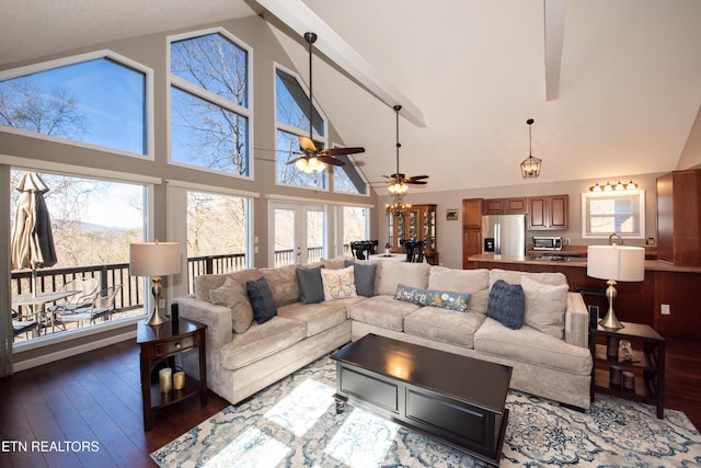 living area featuring high vaulted ceiling, french doors, beamed ceiling, and hardwood / wood-style flooring