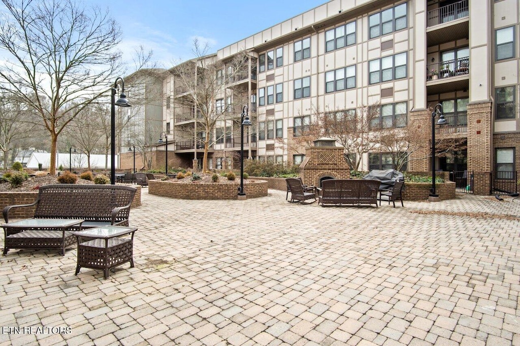 view of property's community featuring a patio area