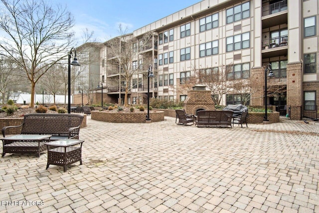 view of property's community featuring a patio area