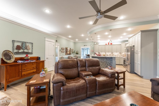 living room with ceiling fan, light wood-style flooring, and recessed lighting