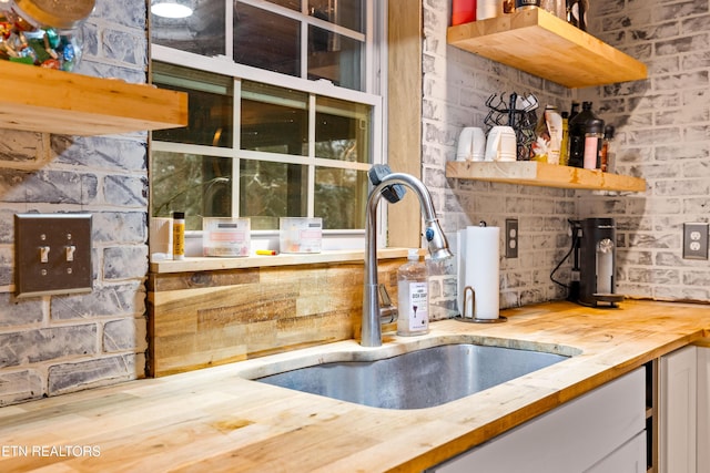 bar featuring a sink