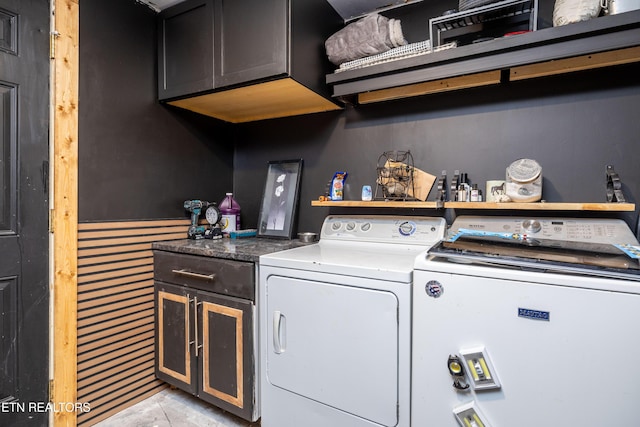 laundry area featuring cabinet space and independent washer and dryer