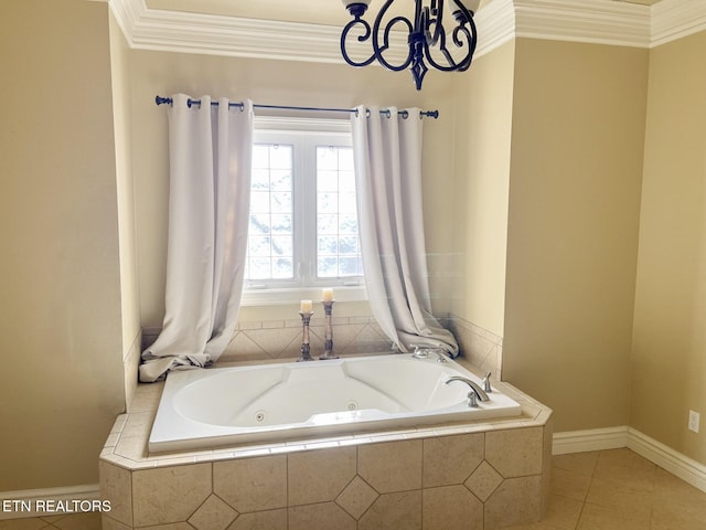 bathroom featuring a whirlpool tub, baseboards, crown molding, and tile patterned floors