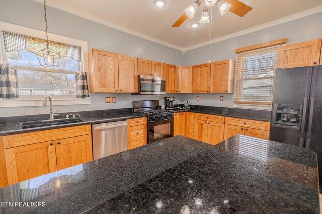 825 E 2nd N St, Morristown, TN 37814 - kitchen with ornamental molding, dark stone counters, a sink, and black appliances