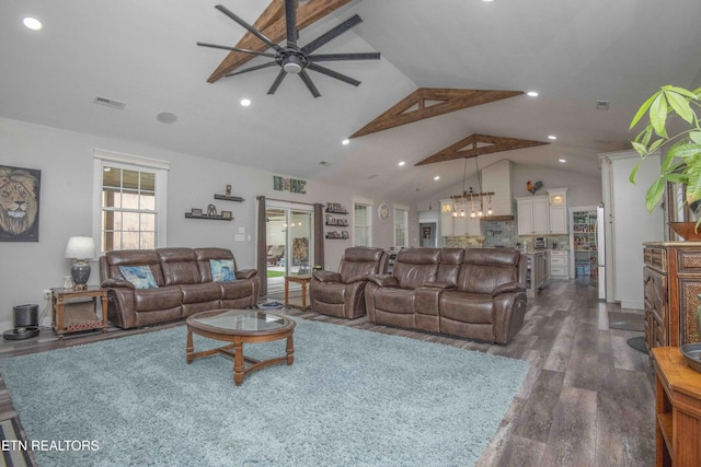 living room featuring a ceiling fan, dark wood finished floors, visible vents, and recessed lighting