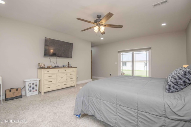 bedroom with ceiling fan, recessed lighting, light colored carpet, visible vents, and baseboards