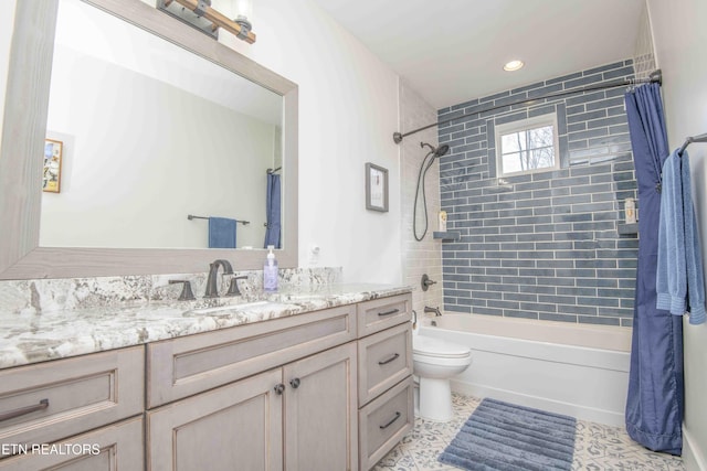 bathroom featuring tile patterned flooring, toilet, shower / bathtub combination with curtain, and vanity