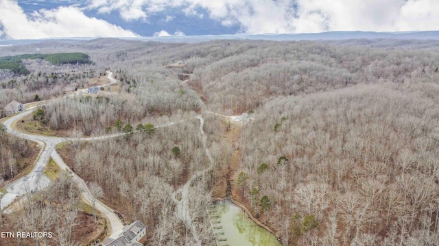 aerial view featuring a forest view