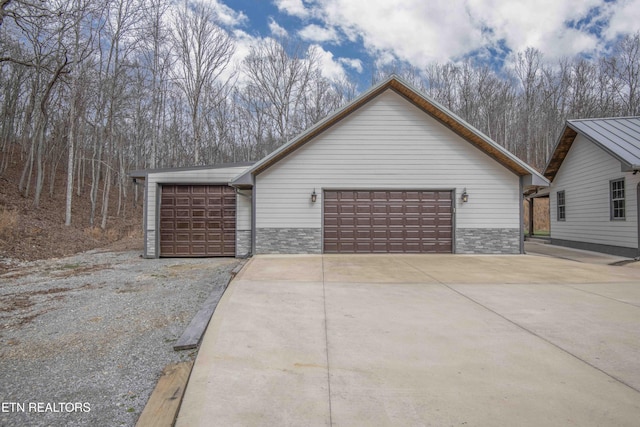 exterior space featuring stone siding