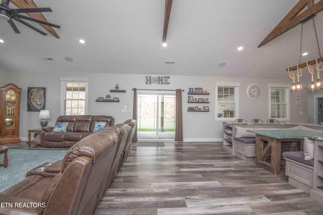 living room featuring recessed lighting, dark wood-type flooring, visible vents, baseboards, and vaulted ceiling