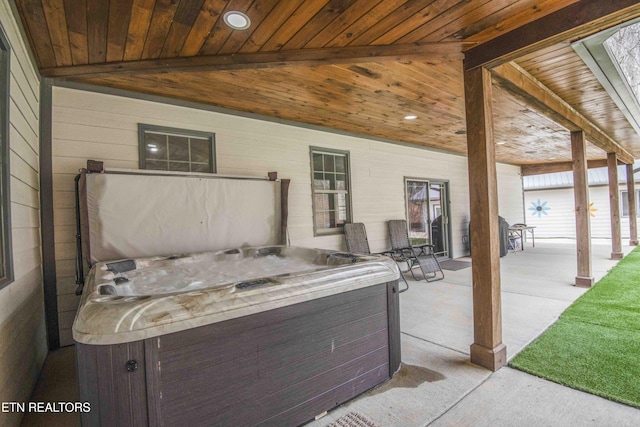 view of patio with a hot tub