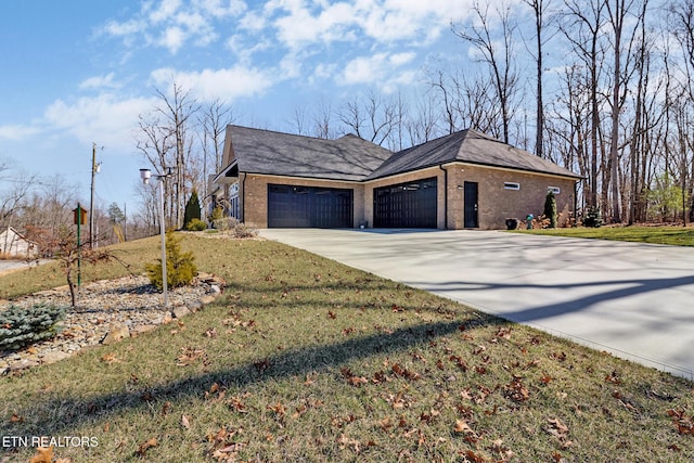 view of home's exterior featuring a yard, concrete driveway, brick siding, and an attached garage