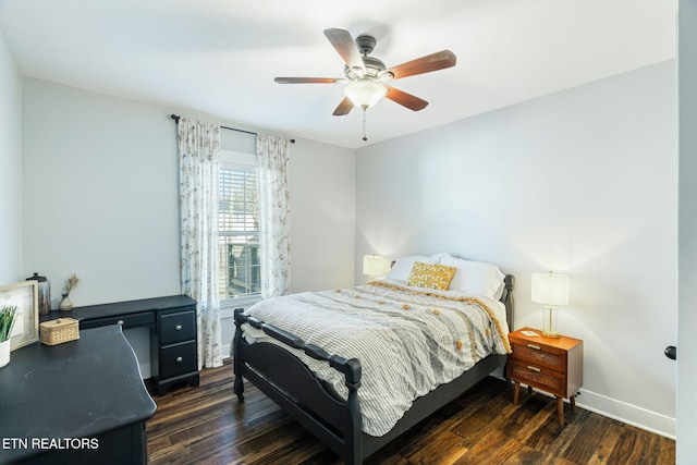 bedroom with dark wood-style floors, baseboards, and a ceiling fan