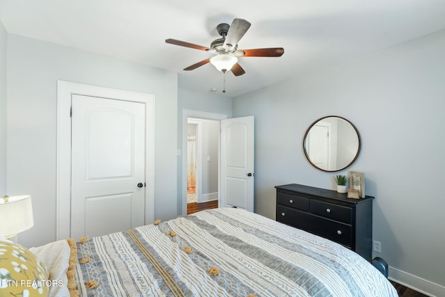 bedroom featuring ceiling fan and baseboards