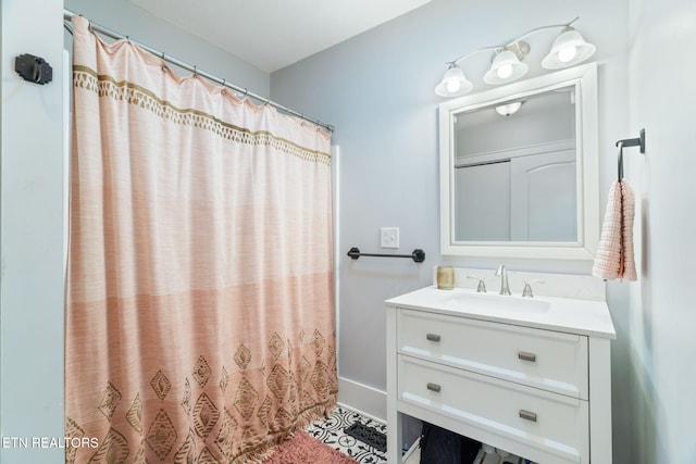 bathroom featuring vanity and a shower with curtain