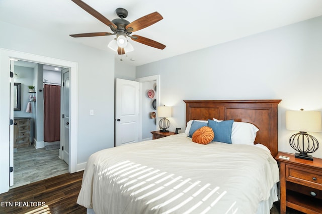 bedroom featuring ceiling fan, baseboards, and dark wood-style flooring