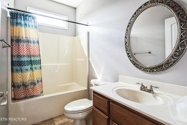 bathroom with toilet, shower / bath combo with shower curtain, and vanity