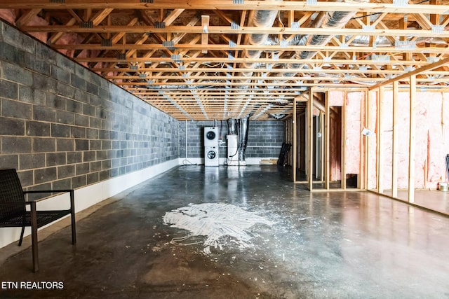 basement with concrete block wall