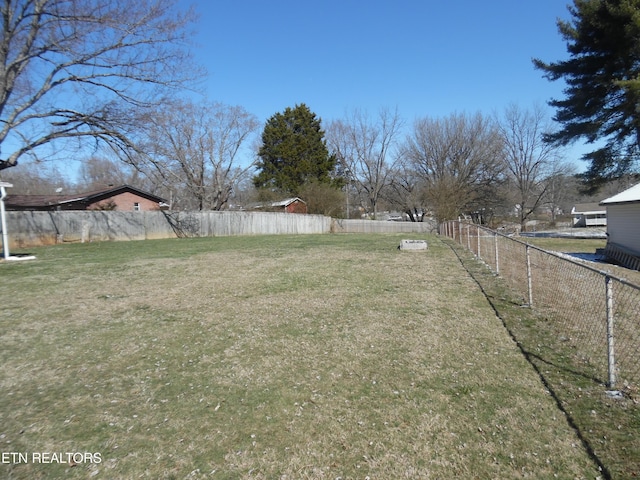 view of yard featuring fence