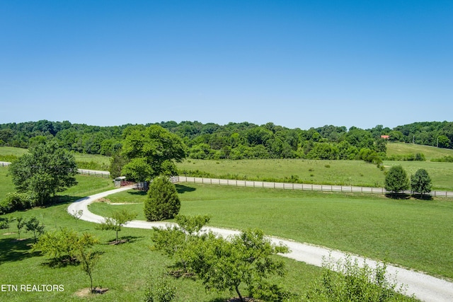 exterior space with a rural view