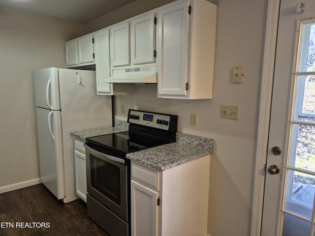 kitchen with white cabinets, stainless steel electric range oven, light stone counters, dark wood-style flooring, and under cabinet range hood