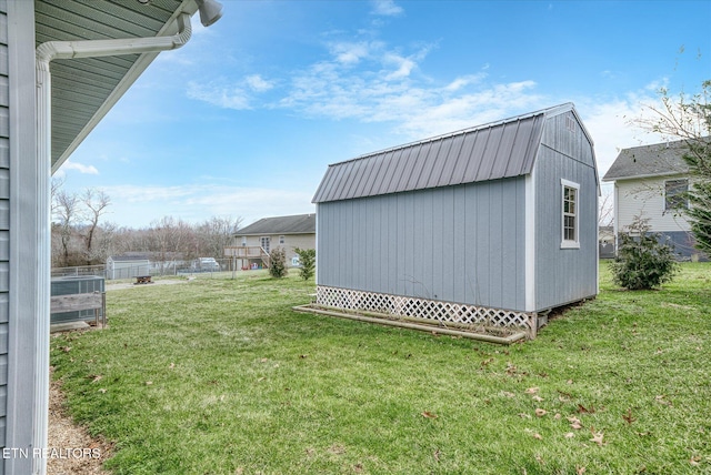 exterior space with a storage shed and an outdoor structure