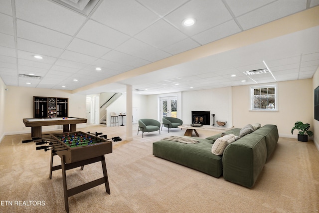 playroom with carpet floors, recessed lighting, visible vents, and a fireplace