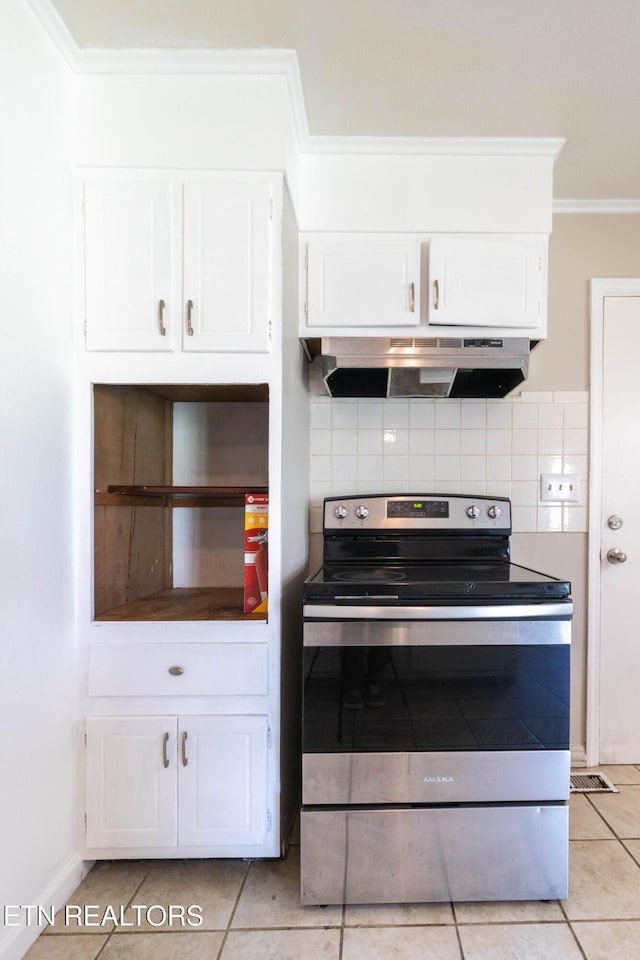 kitchen featuring electric range, ornamental molding, under cabinet range hood, backsplash, and white cabinets