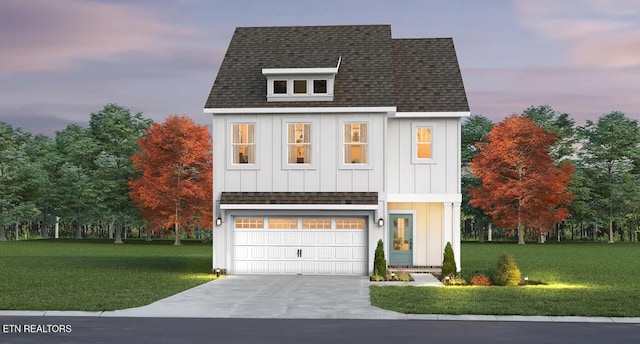 modern inspired farmhouse with driveway, roof with shingles, board and batten siding, and a front yard