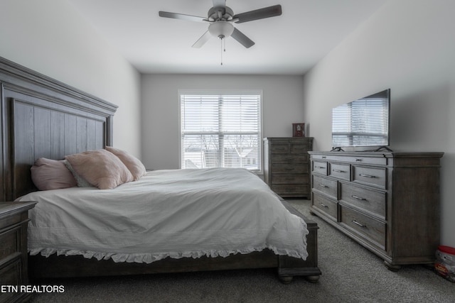 carpeted bedroom featuring a ceiling fan