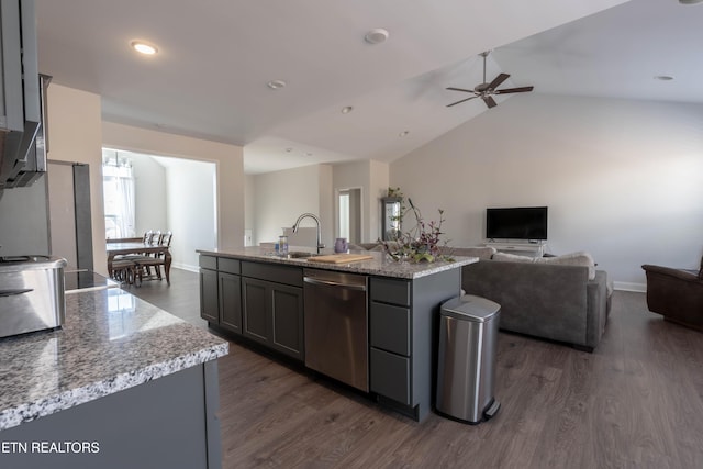 kitchen with open floor plan, stainless steel dishwasher, dark wood-type flooring, and a sink