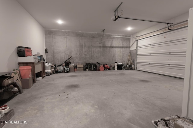 garage featuring a garage door opener