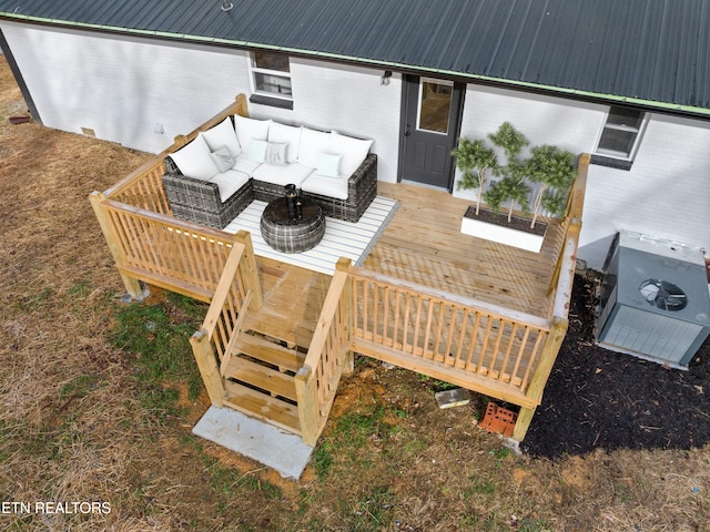 wooden deck featuring an outdoor hangout area